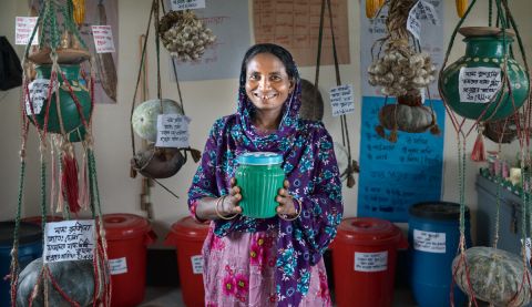 Gulshanara, 45, farmer, grandmother and president of women farmers' group with husband Noab