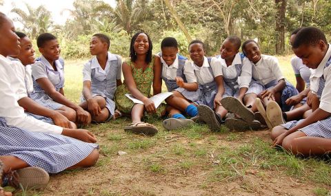 Girls in Nigeria taking training with ActionAid about reproductive health, periods and sexually transmitted diseases, including prevention of HIV/AIDs.