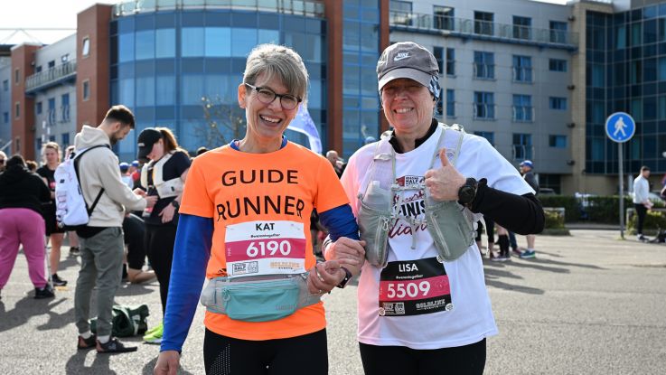 Ladies smile at Reading Half Marathon 2024.